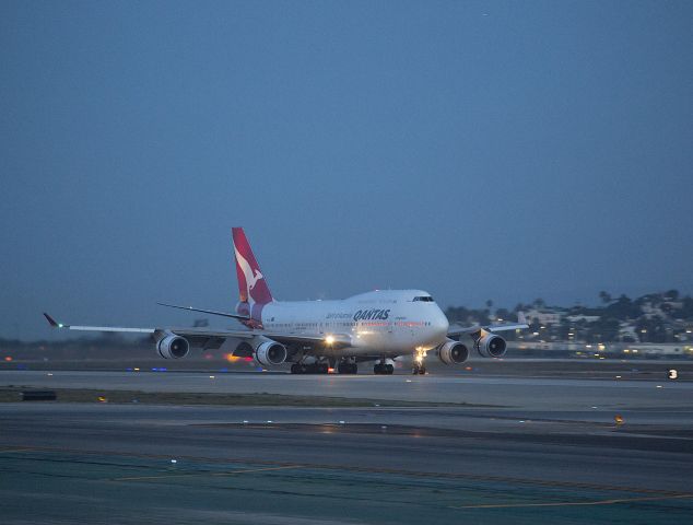 Boeing 747-400 — - This QANTAS 747 has hopped in from Australia to land on runway 6R at LAX, Los Angeles, California USA 06:18 am, 21 Feb 2014