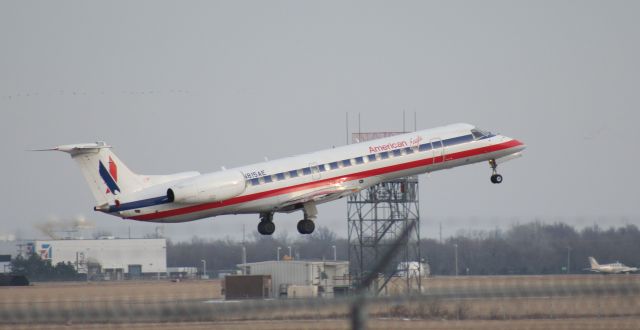 Embraer ERJ-135 (N815AE) - 030414 outbound on Rwy 19R for KORD