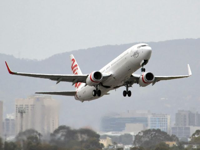 Boeing 737-800 (VH-YFF) - Getting airborne off runway 23. Friday 5th October 2012.