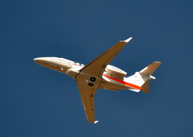 Embraer Phenom 300 (N100FG) - Athletic Dept. Jet for University of Florida, departing Tyson McGhee in Alcoa, TN on 03-15-14