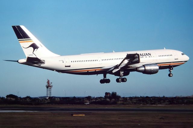 Piper Cherokee (VH-TAE) - AUSTRALIAN AIRLINES - AIRBUS A300B-203 - REG : VH-TAE (CN 218) - KINGSFORD SMITH SYDNEY NSW. AUSTRALIA - YSSY 28/6/1988 35MM SLIDE CONVERSION USING A LIGHTBOX AND A NIKON L810 DIGITAL CAMERA IN THE MACRO MODE.