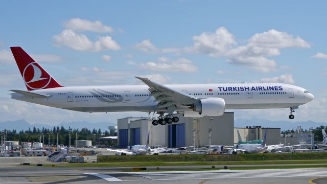 BOEING 777-300 (TC-LJC) - BOE541 on final to Rwy 16R to complete a ferry flight from KPDX on 9/16/15. (ln 1337 / cn 44123). The aircraft was returning after being painted.