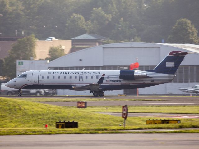 Canadair Regional Jet CRJ-200 (N409AW) - Take off runway 34.