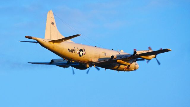 Lockheed P-3 Orion (16-3004) - USN P-3C Orion Code: 004 / Ser#163004 / Cn 5811 / attached to PATRON One - NAS Whidbey Island, WA.  It was making touch / go landings on Rwy 16R at sunset on 3.29.19.