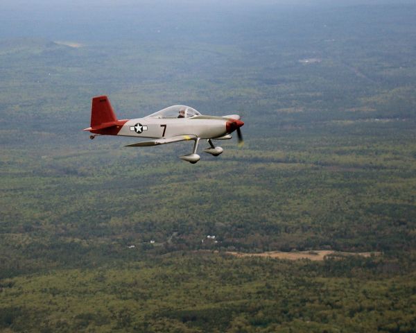 Vans RV-8 (N802RV) - RV-8 in flight over hills of New Hampshire. Paint scheme is Tuskeegee Red Tails.