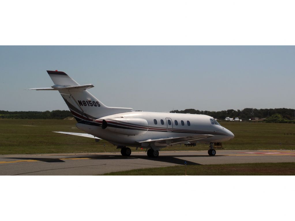 Hawker 800 (N815QS) - Holding short RW24.