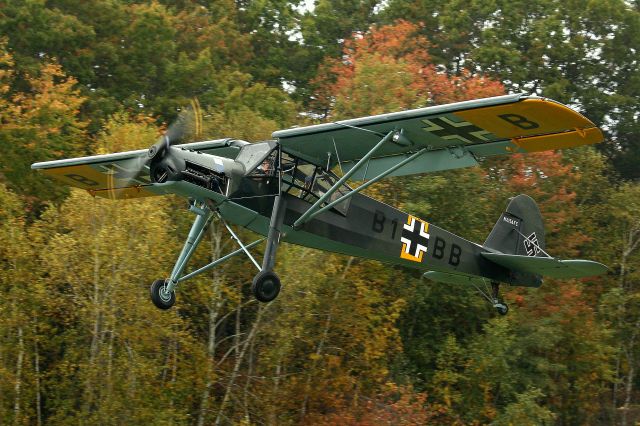 N156FC — - The Collings Foundations Fieseler Storch taking part in the Battle for the Airfield WWII Reenactment on the grounds of the Collings Foundation, Stow, MA.