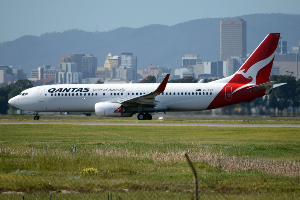 Boeing 737-800 (VH-XZG) - On taxiway heading for Terminal One after landing on runway 23.  Monday 25th August 2014. 