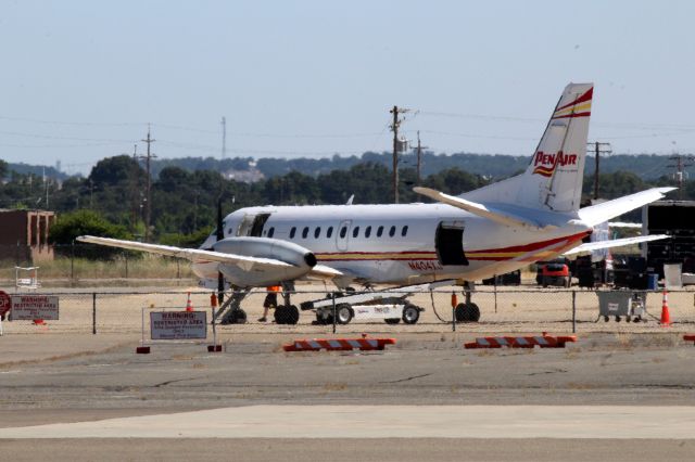 Saab 340 (N404XJ) - KRDD - PenAir 185 loading for departure. SAAB 340 "Spirit of Unalaska" 