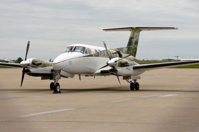 Beechcraft Super King Air 200 (N820UP) - 05-22-22. Sorry for the corner shadows, had to shoot through the chain link