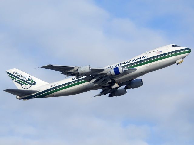 Boeing 747-200 (N488EV) - Former Lufthansa 747-230B departing from Runway 7 Right with a load of Christmas cargo.