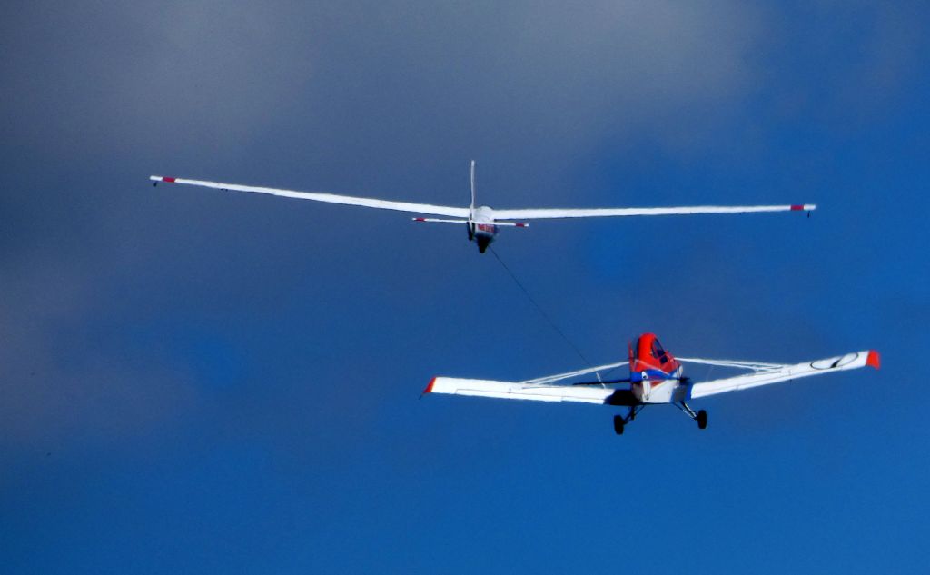 Piper PA-25 Pawnee (N6717Z) - Shortly after departure is this 1963 Piper Pawnee Tow Plane providing a Sailplane a lift to the sky in the Summer of 2018.