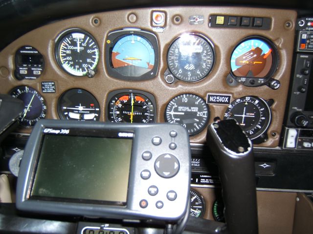 Piper Saratoga (N2510X) - Instrument Panel featuring yoke mounted Garmin 396 GPS linked to the Certificated Panel Mounted Garmin 530 featuring XM Weather Nexrad Radar and TIS Traffic Alert.