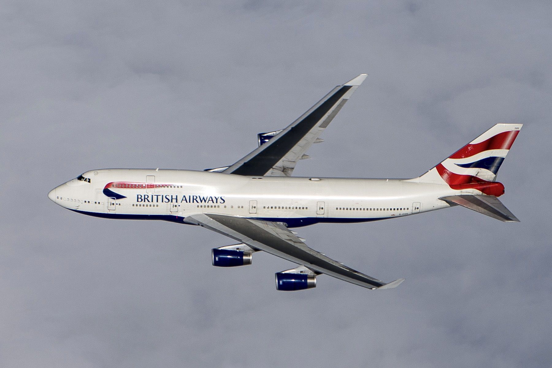 Boeing 747-400 — - This BA B747-400 passed just 1000 ft below us approx 675nm inbound to Bangor, Maine from Southampton UK. We were in Falcon 900EX at FL38 (on Atlantic route F) westbound when this 747 slowly passed under us as we were routed direct to Bangor. Image Nikon800E 24/70 2,8 lens too short really pity I did not have 70-200 lens. Anyway this is a crop from 36mil sensor. Prob closest ever to another aircraft over Atlantic. Date April 4, 2013