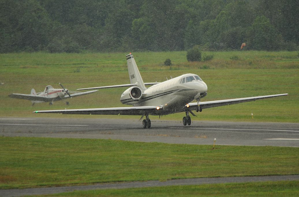 Cessna Citation III (N19MK) - Departing KBLM in a thunderstorm.