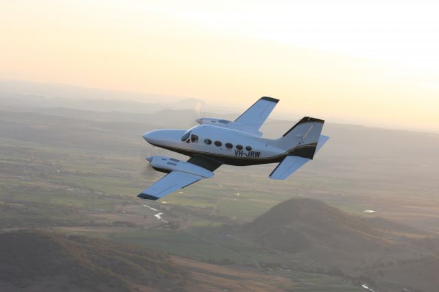 Cessna 421 (VH-JRW) - Airspeed Aviation's C421 Golden Eagle over the Segenhoe Valley near Scone, NSW.