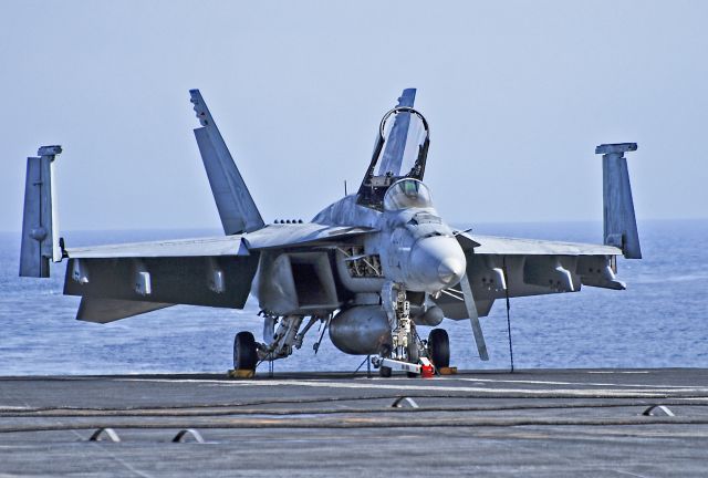 McDonnell Douglas FA-18 Hornet — - USS Ronald Reagan (CVN-76) - F/A-18E Super Hornet  VFA-137 - TDelCorobr /Ronald Reagan (CVN 76)br /April 9, 2014