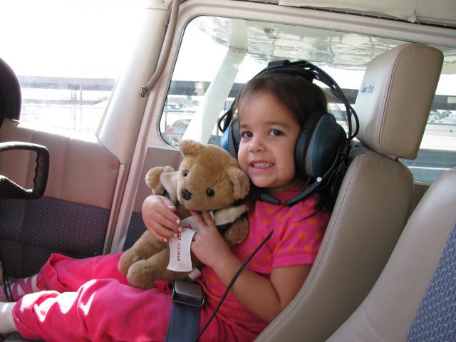 Cessna 175 Skylark (N7688M) - Julie with airplane bear waiting to go flying.