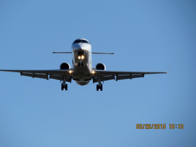Embraer EMB-145XR (N11107) - Express Jet landing on runway 36R at Tulsa International from Houston.