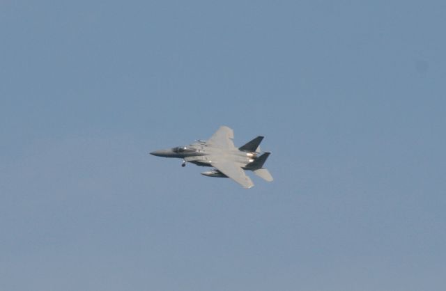 McDonnell Douglas F-15 Eagle — - F-15 Eagle. I was driving north out of Destin passing Eglin AFB where they had numerous jets performing touch and gos. I pulled over and took photos of this impromptu airshow.