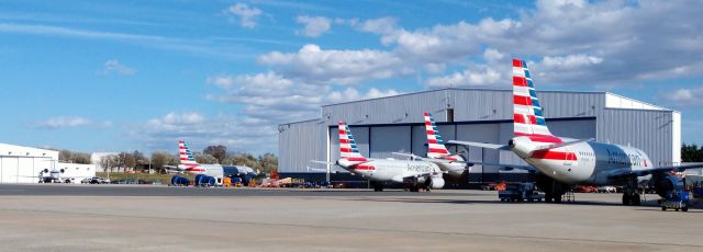 Airbus A319 (N740UW) - A line up of planes at the hanger including N291AY in the hanger for service to the Air Conditioning systembr /br /2/24/19