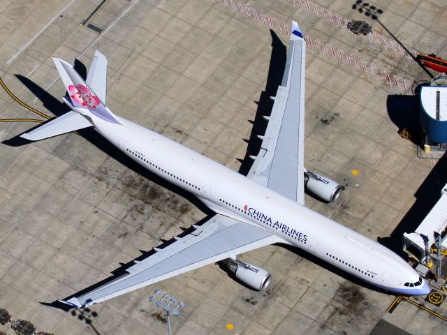 Airbus A330-300 (B-18357) - Resting at the gate before a evening departure back to Taipei.