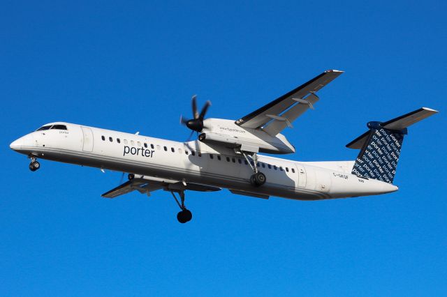 de Havilland Dash 8-400 (C-GKQF) - Porter Airlines Bombardier DCH-8 402 arriving from Toronto Billy Bishop City Airport landing on runway 29 at Newark on 11/20/22.