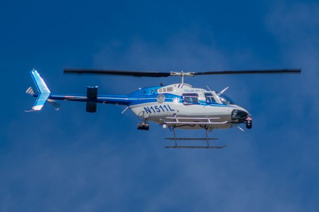 Bell JetRanger (N1511L) - Dallas Police Bell JetRanger flying over the Dallas 2019 St. Patrick's Day parade.