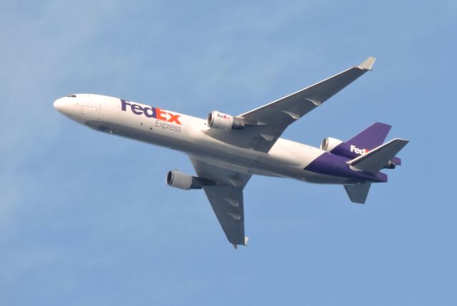 Boeing MD-11 (N523FE) - A FedEx Express on its final approach to JFK in the summer of 2017.