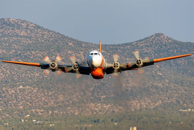 Douglas DC-7 (N838D) - A quick photo tribute to Erickson Aero Tanker's beautiful Tanker 60 - a 1958 Douglas DC-7B. She started her life with Eastern Air Lines before being converted into a fire bomber.br /br /Here she is operating out of the Redmond, Oregon tanker base to make drops on the Green Ridge Fire near Sisters, Oregon back in August. Tanker 60 has been very busy on contract with the State of Oregon this summer, and is currently taking part in heroic efforts by firefighters to slow and stop the fires ravishing the state.br /br /Sadly, Tanker 60 is in its last year of service and will be retired after this wildfire season which will be the end of airworthy DC-7s and leaving CL-215s as the last large piston air tankers remaining.br /br /A true ending of an era for those of us on the west coast in particular!