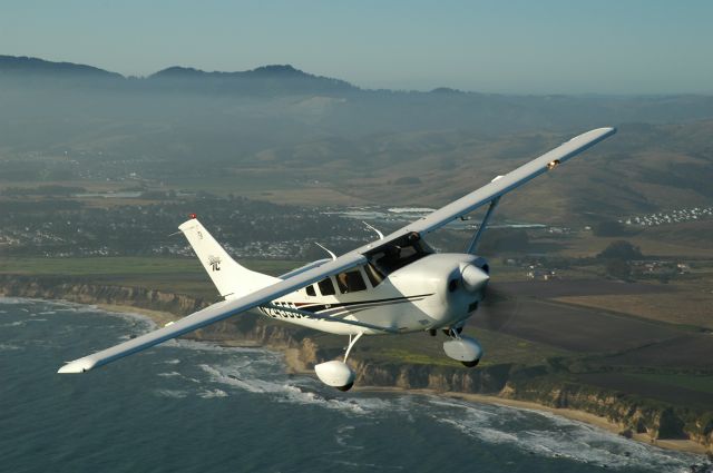 Cessna T206 Turbo Stationair (N24555) - A air-to-air shot from my Cherokee Six, flying south down the shoreline, after leaving the San Francisco area.