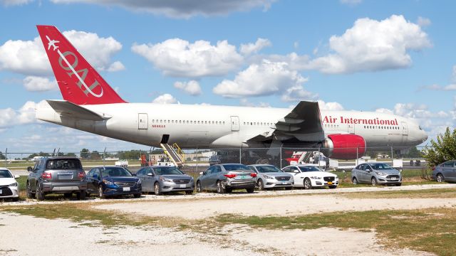 Boeing 777-200 (N846AX) - An Omni Air International 777-200 sitting on the side apron at KSBN doing some military charter work.  9/16/2018