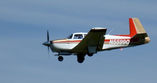 Mooney M-20 (N5599Q) - On short final is this 1965 Mooney M20C in the Summer of 2023.