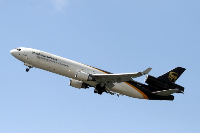 Boeing MD-11 (N250UP) - Departing rwy 08R on 02-Apr-13 operating flight UPS902 to KONT.