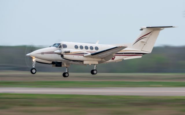 Beechcraft Super King Air 200 (N637WM) - A common site at KEFD is Ohmestede Industries creme colored B200, seen here landing on 35L on 8 March 2024