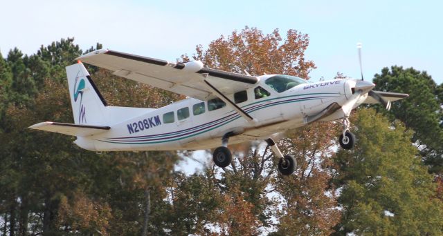 Cessna Caravan (N208KM) - A Cessna 208 Caravan, operated by Skydive Alabama, departing Folsom Field, Cullman Regional Airport, AL, with jumpers, during the 2020 Cullman Veteran's Day Celebration - November 7, 2020. 