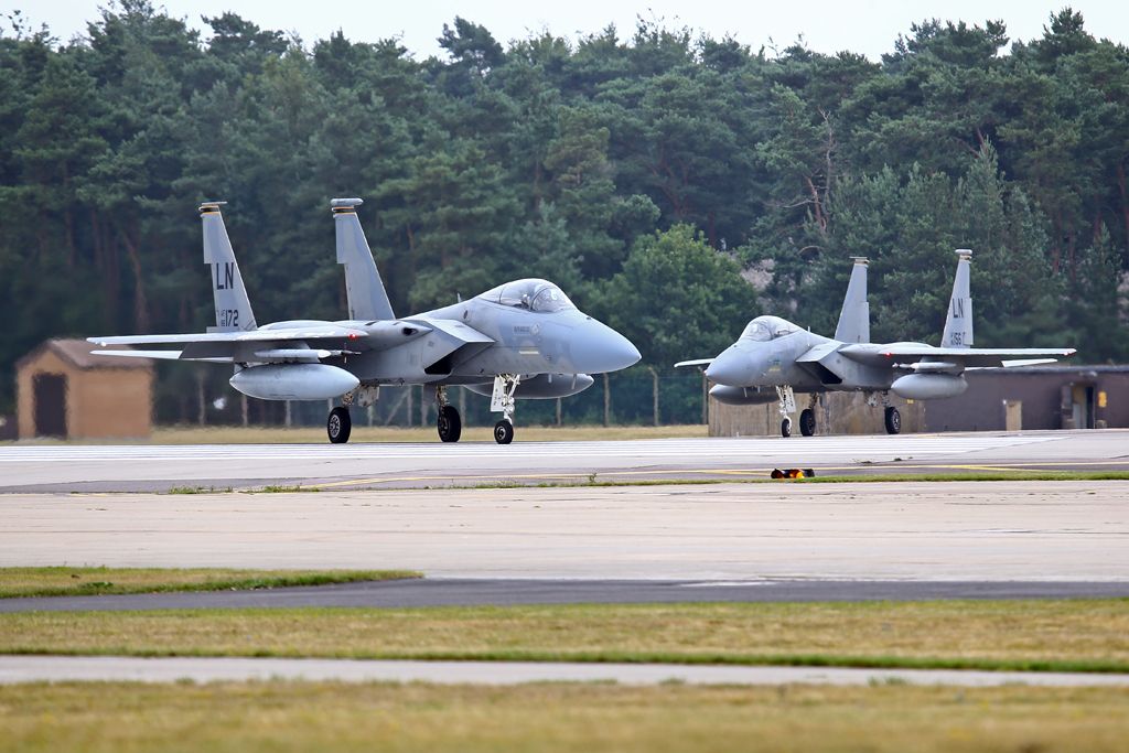 McDonnell Douglas F-15 Eagle — - A pair of Eagles getting ready to depart from their home base in the UK.