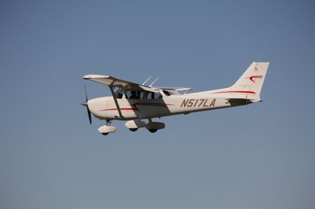 Cessna Skyhawk (N517LA) - Picture taken by spouse as I was landing at KIWS runway 33