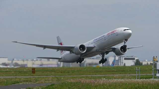 BOEING 777-300 (B-7347) - CES9002 on rotation from Rwy 16R beginning its delivery flight to ZSPD/PVG on 4/21/16. (ln 1387 / cn 43278).