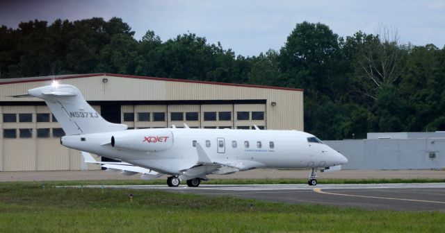 Bombardier Challenger 300 (N537XJ) - Departing down the active runway is this 2008 Bombardier Challenger 300 in the Summer of 2019.