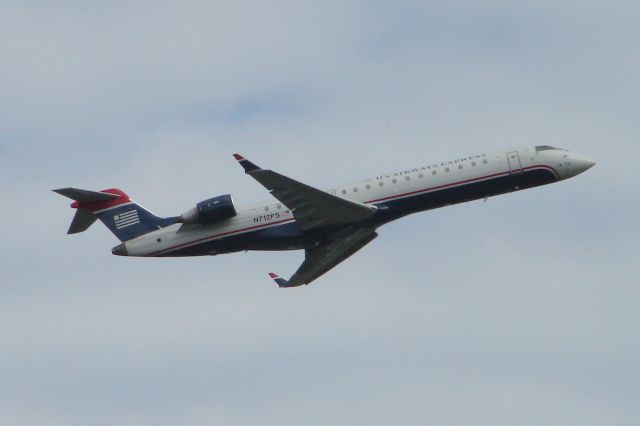 Canadair Regional Jet CRJ-700 (N712PS) - PSA Airlines/US Airways Express Flight 2232 on departure from Runway 14 at Sarasota-Bradenton International Airport