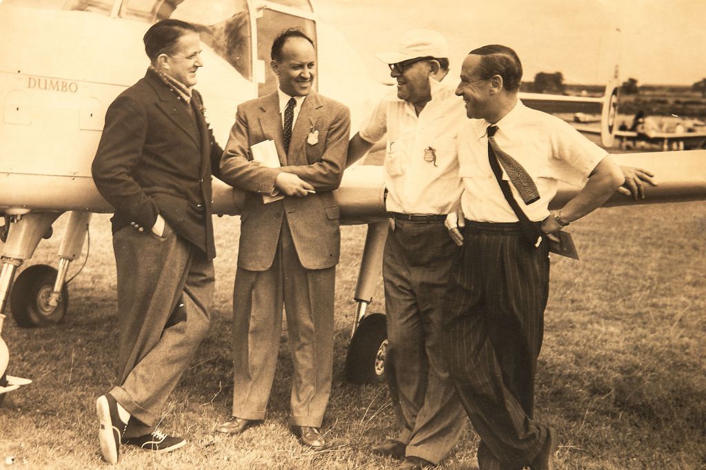 — — - British air racing scene abt 1950 - centre are famous pilots Nat Somers and Ernie Crabtree. Image from original photo - one of the pilots is a relative all now in the great hangar in the sky. Much period atmosphere.