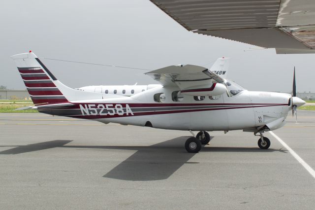 Cessna P210 Pressurized Centurion (N5258A) - "From under the wing" shot. A grey day and poor color. -April 2014. 