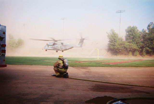 — — - Providing crash rescue for presidential helicopter escort