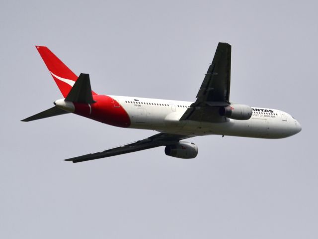 BOEING 767-300 (VH-ZXF) - Getting airborne off runway 23 on a gloomy, cold day. Wednesday, 4th July 2012.