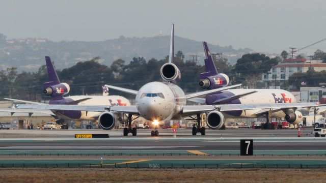 McDonnell Douglas DC-10 (N389FE) - 3 classic tri-jets grace the tarmac at SAN on this beautiful morning. I will miss the DC-10/MD-10s once FedEx retires them. Long live the tri-holers!