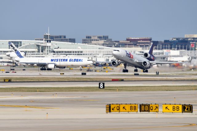 Boeing MD-11 (N610FE) - WGA Mad Dog watching one of her siblings depart.