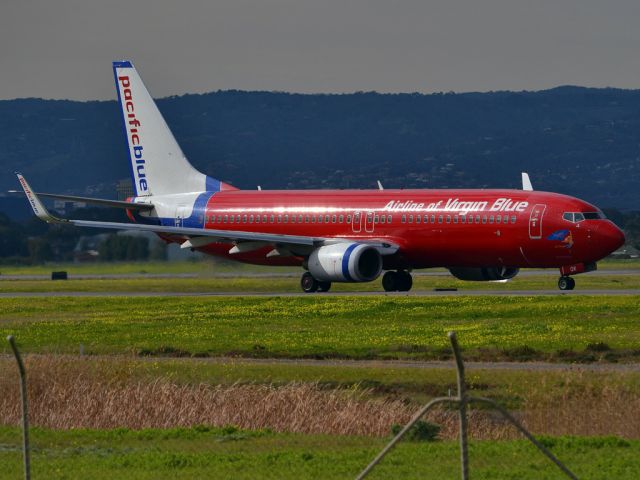 Boeing 737-800 (VH-VOX) - On taxi-way heading for take off on runway 05. Thursday 12th July 2012.