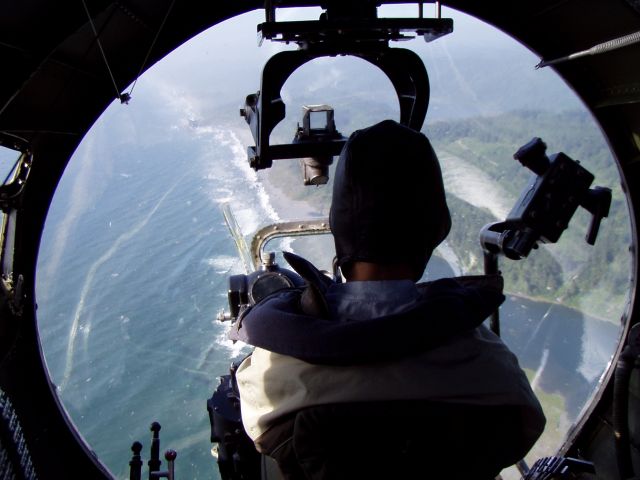 — — - The view from the bombardier's position on the Collings Foundation's B-17G "909".  This photo was taken north of the Arcata Airport, along the Humboldt County coast (CA).