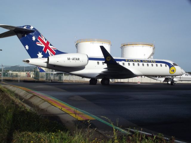 Bombardier Global Express (M-ATAR) - Clive Palmers Globex sits at Platinum in Palmer United livery.